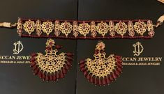 Ready to ship choker with earrings width of choker 1 inch length of choker 9 inch Length of earrings 2.5 inch width 2 inch made using onyx ruby beads with cz polki and 22ct gold plating delivered in 3-5 days within USA Ceremonial Temple Jewelry Choker With Stone Work, Heavy Temple Jewelry Choker Sets, Traditional Choker With Intricate Design For Party, Traditional Hand Set Choker Jewelry Sets, Traditional Hand-set Choker Jewelry Sets, Chandbali Hand Set Choker For Festivals, Ceremonial Meenakari Jewelry Sets In Choker Style, Ceremonial Meenakari Choker Jewelry Sets, Traditional Heavy Choker For Parties