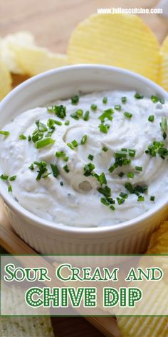 sour cream and chive dip in a white bowl with chips on the side text reads sour cream and chive dip