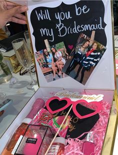 the bridesmaid gift box is filled with personalized items