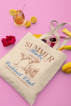 🍸 "Summer Babe Cocktail Club" Tote - Suns, Sips, and Sisterhood  Welcome to Our Summer Babe Collection! Elevate your style with the "Summer Babe Cocktail Club" Tote, perfect for those who enjoy the sparkle of summer and the joy of a good drink. This isn't just a trendy accessory--it's a staple for all your fun-filled outings. 🌞🏖️ Dive into the season with this stylish tote, crafted from 100% cotton canvas to ensure long-lasting durability. Featuring a neutral color palette, this bag is your g Vintage Vibes Aesthetic, Aesthetic Tote Bag, Cocktail Club, Relaxing Day, Classic Cocktails, Vintage Inspired Design, Bag Vintage, Trendy Accessories, Vintage Vibes