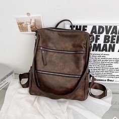 This bag is a backpack, can also be used as a shoulder bag, soft surface design, you can carry it when you go out to play, you can also carry it on a date, whenever you need to pack something can take it. product description Material: PU Color: pink, blue, black, brown Style: Vintage Size: Length 32cm Width 12cm Height 35cm Weight: about 600g If you have any questions, please contact me in time! Thank you~ Back To School Satchel With Zipper Closure, Back To School Shoulder Satchel With Zipper Closure, Back To School Shoulder Satchel With Zipper, Casual Brown Portable Backpack, Back To School Satchel Shoulder Bag With Zipper, Large Capacity Leather Backpack For School, Large Capacity Leather Backpack For Back To School, Casual Brown Backpack, Satchel Bag With Zipper Closure For Students