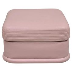 a pink suitcase with zippers on the top and bottom, sitting in front of a white background