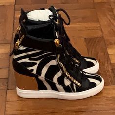 Zebra Printed Wedge Sneaker With Gold Hardware On The Back Zipper On Both Sides Of The Sneaker Modern Wedge Heel Platform Sneakers, Chic Leather Wedge Sneakers, Shoes Wedges Sneakers, Zanotti Shoes, Womens Shoes Wedges, Wedge Sneaker, Zebra Print, Both Sides, Wedge Shoes