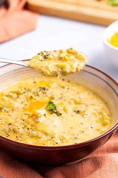 A bowl of creamy broccoli cheddar soup with a spoon lifting a cheesy, broccoli-filled bite, showcasing the rich texture and vibrant ingredients. Easy Broccoli Cheddar Soup, Creamy Broccoli Cheddar Soup, Cheesy Broccoli Soup, Broccoli Cheddar Soup Recipe, Cheddar Soup Recipe, Easy Broccoli, Homemade Soup Recipe, Broccoli Cheese Soup, Broccoli Cheddar Soup