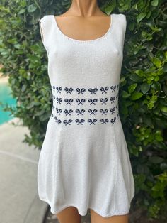 Vintage 1970 Hampton Court Knit tennis dress. Pulls over your head. Bust 36",waist 30", Length from top of shoulder down to hem 31". Beige color with navy blue tennis racquet waist. In very nice vintage condition Head Bust, Womens Sports, Tennis Racquet, Tennis Dress, Vintage 1970s, Beige Color, Sports Women, Sport Fitness, Halloween Shopping