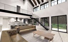 a large open concept living room with high ceilings