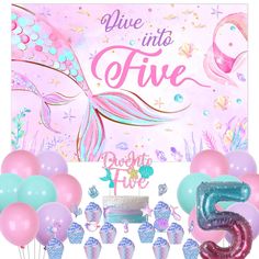 a mermaid themed birthday party with balloons and decorations