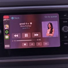 an image of a car dashboard with the radio on it's display and other electronic devices