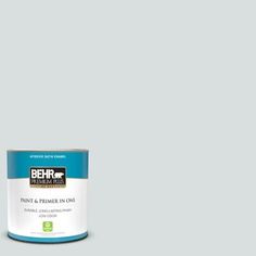 the behr paint is light gray and it has a green tint on top