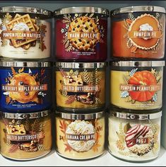 many different flavors of pumpkin pies and waffles in tins on a shelf