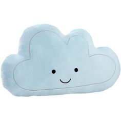 a blue cloud pillow with a smiling face on it's front and back end