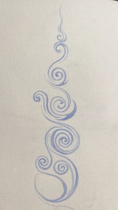 a drawing of a spiral design on paper