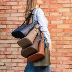 This trendy bucket-shaped bag is crafted from vegan leather and designed for both style and functionality. This women's shoulder bag is simple, fancy, and durable. It greatly fits for various purposes. Our faux leather tote is perfect as a work bag, for everyday wear, running errands, or as a weekend look accomplishment. As it goes as a set with a cosmetic bag which can be also used as a small zippered crossbody bag. Vegan Leather Women's Bag  - made of high quality vegan leather - one main comp Eco-friendly Shoulder Bag With Leather Handles For Everyday Use, Versatile Leather Shoulder Bag With Anti-theft Pocket, Work Bag, Womens Tote, Womens Tote Bags, Shoulder Bag Women, Leather Tote, Cosmetic Bag, Bag Making