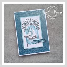 a close up of a greeting card with a dragon on the front and an embossed background