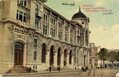 an old postcard shows people walking on the sidewalk in front of a large building