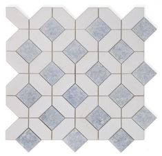 a white and blue tile with grey squares