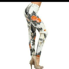 Soft..Breathable..And Smooth Inside And Out. This Material Stretches To Fit The Contours Of Your Body. One Size Fits Most All Around Measurements: Waist 23" Hips 28" Rise 9.5" Inseam 27.5" Length 37" Ankle 10" Polyester/Spandex Non-stretch White Pants With Floral Print, Non-stretch White Floral Print Pants, White Non-stretch Floral Print Pants, White Non-stretch Casual Leggings, Non-stretch White Printed Bottoms, White Stretch Printed Pants, Printed Fitted Leggings For Spring, High Waist Printed White Pants, Spring Printed Fitted Leggings