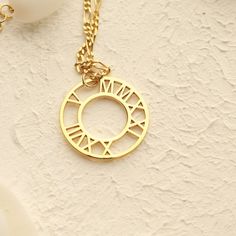 Capture your beloved's special anniversary date in a timeless way. Our Roman Numeral Necklace is the perfect gift for an anniversary milestone, personalized with the date of your choice. Create a beautiful, lasting keepsake to share your love for each other and remember your special day. Are you ready to find a gift that lasts? + How to Order1 : Choose necklace size: 14” to 24” (inches)2: Add your personalization request: Please use the "Personalization Box" to let us know the Roman Numeral Date