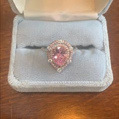 Size 7. Never Worn. Pink Teardrop Jewelry With Center Stone, Pear-shaped Vs Clarity Jewelry Gift, Elegant Pink Teardrop Ring, Pink Teardrop Jewelry With Halo Setting, Pink Teardrop Anniversary Ring, Pink Teardrop Halo Setting Ring, Pink Pear-shaped Rings For Gift, Rose Gold Teardrop Jewelry With Center Stone, 7 Rings