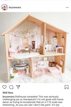 a doll house with furniture and accessories in the inside, on a white furnishing