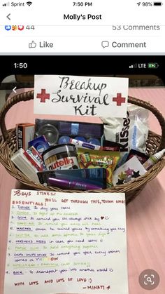 a basket filled with items sitting on top of a table next to a paper sign