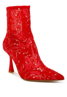 These elegant Sequin Lace Ankle Boots feature a closed pointed toe, spool heels, and sequins and sheer detailing for a touch of glamour. The comfortable cushion insole and zipper closure provide both beauty and comfort. Made with lace upper and rubber outer sole, perfect for any occasion. Heel Height: 3.5 inches Spool Heels, Lace Outer, Beautiful Wedding Shoes, Lace Ankle Boots, Plush Cushion, Formal Dress Shops, Zipper Heels, Elegant Aesthetic, Spool Heel