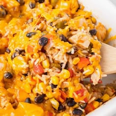 a white bowl filled with mexican rice and beans