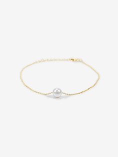 Are you a minimalist who loves dainty and simplistic designs? Then we have a bracelet that is just the right one for you. The Abby Single Pearl Bracelet is just what its name implies. The design features a big shiny pearl as the centerpiece. This single adornment is all the bracelet needs to deliver a powerful and highly elegant impact for you.- Rhodium and Gold plating over Sterling Silver- 1 cubic zirconia pearl, 6mm in diameter- Adjustable length of 5.5" to 6.5"- Available in Yellow Gold, Whi Single Pearl, Simplistic Design, A Bracelet, Swarovski Pearls, Pearl Bracelet, Delicate Bracelet, Gold Plating, Are You The One, Design Features