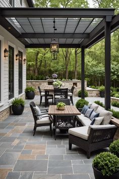 an outdoor patio with seating and tables