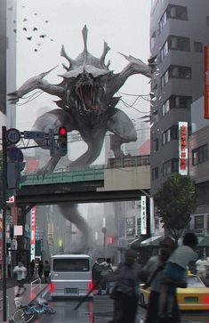 people walking on a city street in front of a giant monster billboard that is hanging from the side of a building