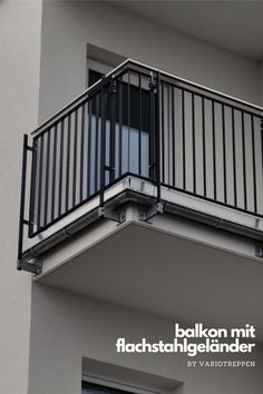 an apartment balcony with balconies and railings