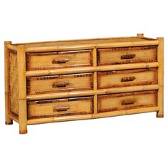 a wooden dresser with drawers and handles on it's sides, made out of bamboo