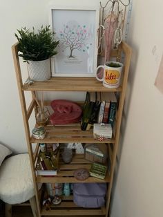 a wooden shelf filled with lots of items