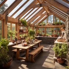 a room filled with lots of plants and potted plants on top of wooden tables