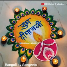 rangolii by sangeetta with candles on the floor