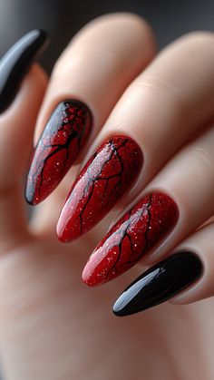 Black veins on red nails create a chilling, eerie effect perfect for Halloween. This spooky design adds a hauntingly unique touch to your look. Click the pin for more Halloween nail ideas and follow us for your next bold style! #HalloweenNails #VeinNails #RedAndBlackNails #SpookyNailArt #NailInspo Halloween Nail Designs Red And Black, Halloween Nails Red Black, Red Nails Black Design, Red Simple Nail Designs, Black Red Halloween Nails, Red Black Halloween Nails, Red Witch Nails, Vampire Nail Designs, Fall Nails2024