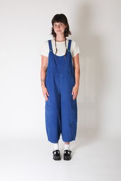 The pants all your friends have been talking about, but it's even better, it's the Meals Overalls! 5 pocket overalls. Soft-washed Cotton Canvas. On-seam pockets, big patch pockets, back pocket, and tong loop. Mock 'fly'. Made in Los Angeles. Cold gentle wash. Wash separately. Hang Dry Amara Dress, Layering Jacket, Smokey Topaz, Knit Alpaca, Favorite Daughter, A Perfect Circle, Baggy Pant, Long Jumpsuits, Knit Pants