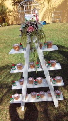 there are many desserts on the table in the yard, ready to be eaten