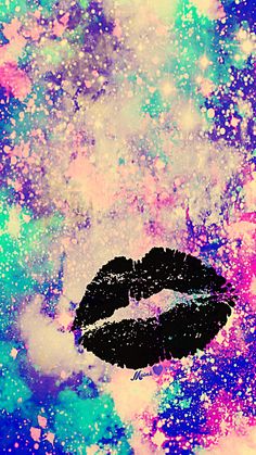 a black lipstick kiss on a colorful background