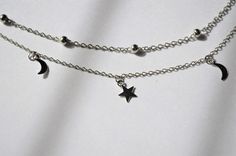 adjustable necklace: - shortest: 36.0 cm - longest: 41.0 cm Available in gold note: can be worn as a choker (low-rise, as pictured) or necklace Adjustable Silver Choker With Star Charm, Adjustable Silver Star Choker, Silver Choker With Moon Charm As A Gift, Silver Adjustable Moon Shaped Choker, Silver Choker With Moon Charm For Gift, Adjustable Silver Moon Shaped Choker, Moon And Star Necklace, Moon Choker, Star Choker