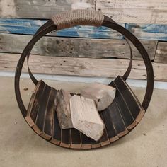 a piece of wood sitting on top of a wooden table next to a pile of logs