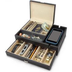 an open briefcase filled with lots of different types of items on top of each other