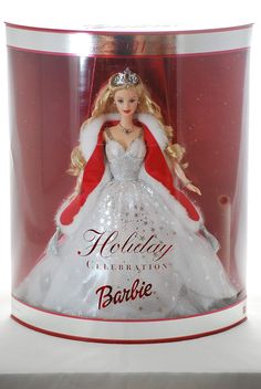 a glass jar with a barbie doll in it