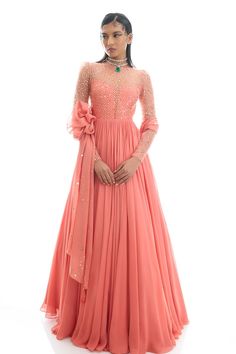 Apricot crush anarkali with sequins embroidery. Paired with coordinating dupatta. - Aza Fashions Hand Embellished Anarkali Georgette Gown, Peach Anarkali Floor-length Dress, Peach Anarkali Set For Reception With Traditional Drape, Designer Hand Embellished Pink Anarkali Set, Peach Anarkali Dress For Festive Occasions, Peach Reception Dress With Sheer Dupatta, Peach Anarkali Set With Resham Embroidery For Reception, Bollywood Style Hand Embellished Anarkali Set, Hand Embellished Semi-stitched Anarkali Set