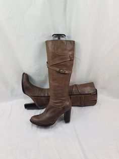 Brown gogo style round toe knee high boots made of genuine leather. These beautiful wide heel boots look great with a jacket or coat. The soft leather makes these shoes very comfortable. Renaissance style boots are always spectacular shoes. In a single copy. These boots are a vintage accessory. Rare vintage high heel boots. Limited edition, in good condition. I can send additional photos upon request. Materials: leather The circumference calf width - 14 Inches Boots height - 18,5 Inches Heel hei Brown Wide Calf Knee-high Boots, Vintage Brown Knee-high Boots For Winter, Vintage Knee-high Heeled Boots For Winter, Vintage Knee High Boots, Vintage Brown Leather Knee-high Boots, Vintage Knee-high Heeled Boots, Vintage Knee-high Platform Boots, Brown Knee-high Moto Boots Medium Width, Brown Wide Calf Mid-calf Heeled Boots