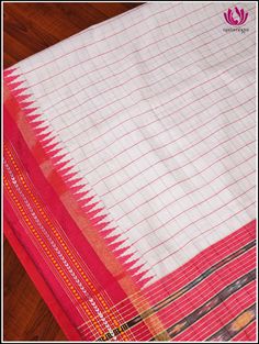 The silk sarees with the top and bottom borders in contrasting colors are called ganga jamuna border sarees. A half white raw silk saree features a natural, textured appearance with two color check patterns on the body and finishes in a detailed pallu with broad stripes and motifs . The red and black ganga jamuna border implies traditional design, where the contrasting colors blend together to create the mesmerizing effect, making it a perfect choice for any occasion. Silk Mark Certified guarant Raw Silk Saree, Navratri Special, Check Pattern, Handloom Saree, Color Blending, Raw Silk, Traditional Design, Silk Sarees, Contrasting Colors