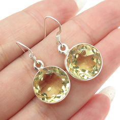 Great vintage condition.  925 Sterling Silver Vintage Real Round-Cut Citrine Dangling Earrings  Weight: 6.9g   WELCOME TO PAWN SHOP We are an actual pawn shop and have been in business for over 25 years. Since 1990, our establishment has been serving a variety of clients by providing them with short term cash solutions and options of liquidity regarding their treasured heirlooms. Acknowledging that today′s customers are very sophisticated and are looking for a variety of investments, our acquisi Pawn Shop, Dangling Earrings, 25 Years, Citrine, Round Cut, Halloween Shopping, Jewelry Earrings Dangle, Etsy Earrings, Dangle Drop Earrings