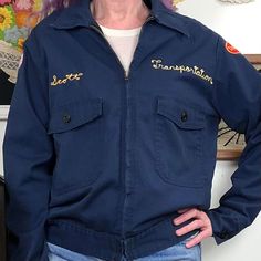 "Vintage Workwear Style Jacket, 1970s Delivery Driver Jacket with Chainstitching and Patches, Size L-XL Dark navy blue jacket is made of a cotton twill fabric and has a zip-out quilted lining. The lining includes the sleeves, and is a nylon or polyester material with a thin amount of poly fill to help with warmth.  The jacket has yellow chain stitch detail on the front that reads \"Scott\" and \"Transportation\".  One arm patch is for \"Taystee\" and the second is an American flag. Two large fla Eyelet Maxi Dress, Worker Jacket, Workwear Style, Denim Workwear, Delivery Driver, Navy Blue Jacket, Vintage Workwear, Workwear Jacket, Workwear Fashion