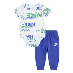 Your active baby will love the feel of this boys' Nike all-over print bodysuit and sweatpants set. Click on the BABY PRODUCTS & CLOTHES GUIDE to find everything you need to keep your baby healthy and happy!FEATURES 2-piece set includes: bodysuit and pants Bodysuit: crewneck, short sleeves with lapped shoulders, inseam snap closure, and an all-over print Pants: elastic waistband and Nike Futura logoFABRIC & CARE Bodysuit: cotton Pants: cotton, polyester Machine wash Imported Size: 6 Months. Color Bodysuit And Sweatpants, Baby Boy Nike, Pants Cotton, Kids Pattern, Healthy And Happy, Sweatpants Set, Boys Nike, Print Pants, Print Bodysuit