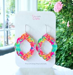 Preppy bright teardrop tropical earrings! These fun dangle earrings boast a captivating pattern in vibrant summer striking colors. Each earring measures a perfect 2.10 -2.25" from the stainless steel hooks and 1.15 - 1.35" wide Note: Each pair of earrings will have a unique pattern, so no two are exactly alike They gracefully sway with every movement. Crafted with premium acrylic material, these earrings are lightweight and comfortable for all-day wear. Perfect for adding a pop of color and a touch of desert-inspired charm to any outfit.  Arriving in a gift bag accompanied by a polishing cloth, these earrings are carefully packaged in a shipping box to guarantee their safe journey to you. Should you have any inquiries, please do not hesitate to reach out to us. Summer Multicolor Hypoallergenic Earrings, Summer Hypoallergenic Multicolor Jewelry, Rainbow Dangle Earrings For Summer, Vibrant Rainbow Drop Earrings, Colorful Summer Dangle Jewelry, Colorful Drop Earrings For Summer, Colorful Vibrant Summer Earrings, Vibrant Colorful Summer Earrings, Fun Rainbow Earrings For Summer